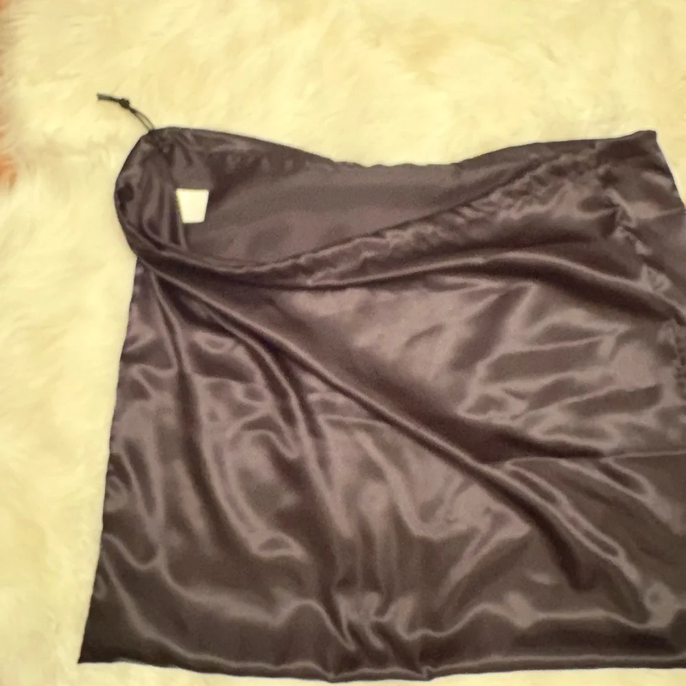 Black silky dust bag drawstrings